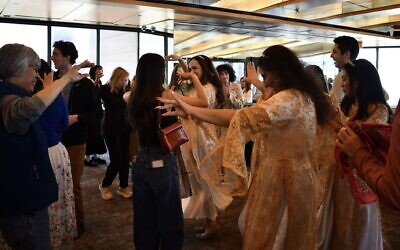Festival goers dance at the Nowruz spring equinox festival at the Museum of Jewish Heritage. (Jackie Hajdenberg via JTA)
